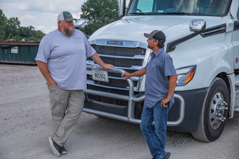 Drivers and recruiter talking